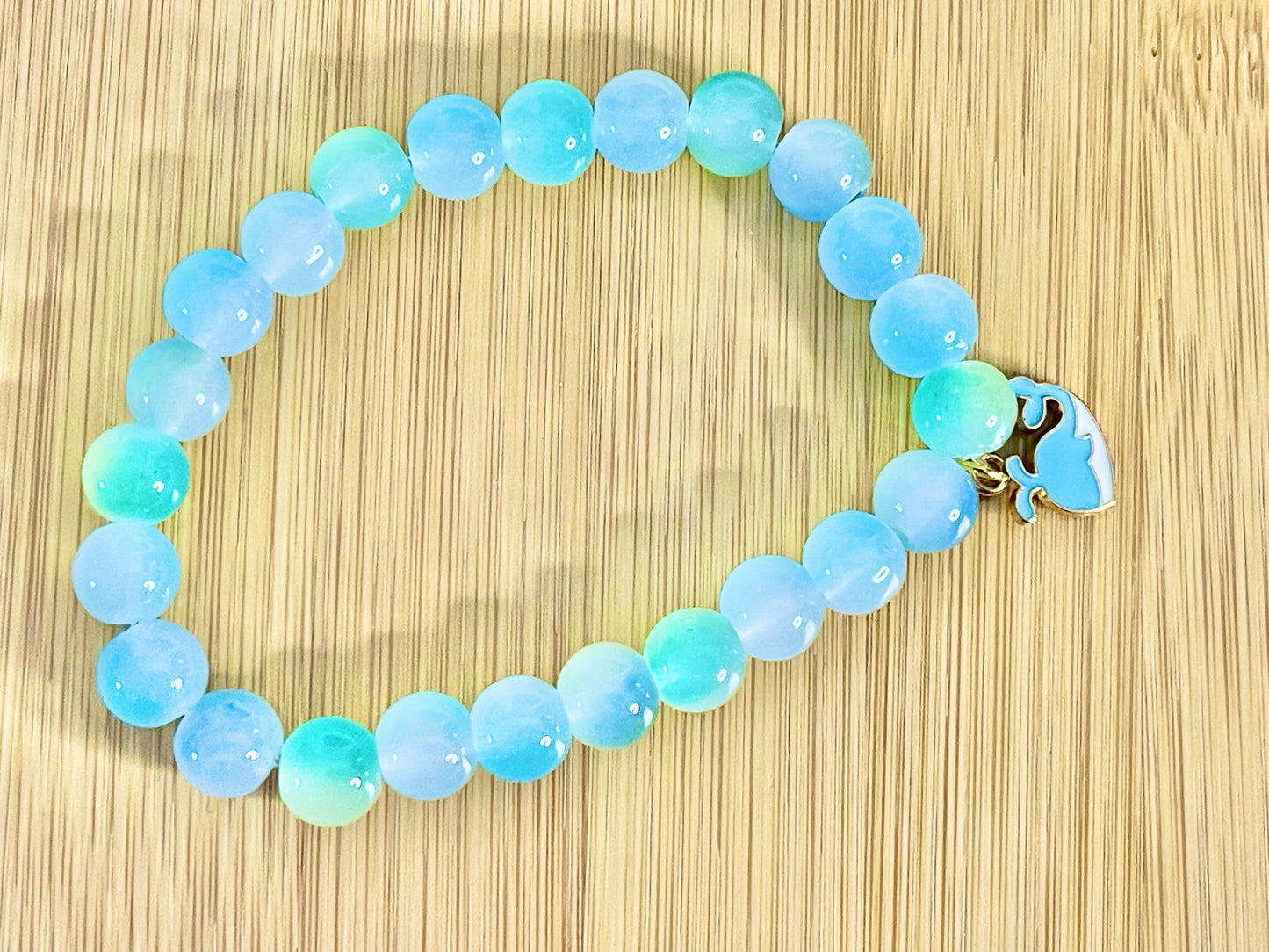 Charmed glass beaded bracelet