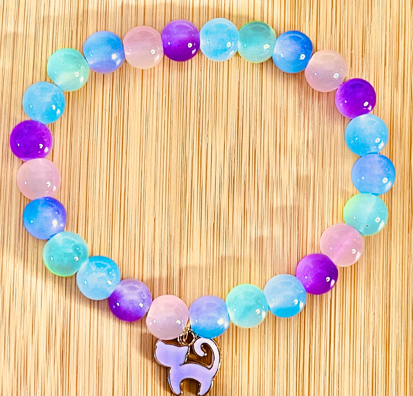 Charmed glass beaded bracelet