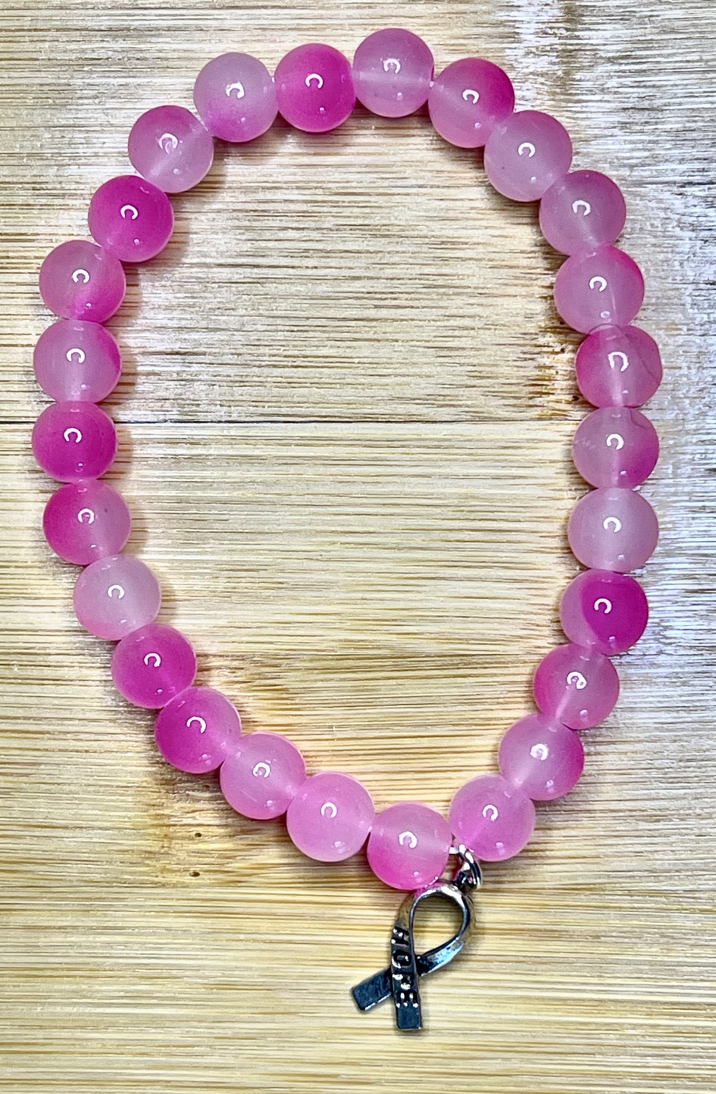breast cancer hot pink glass bead bracelet